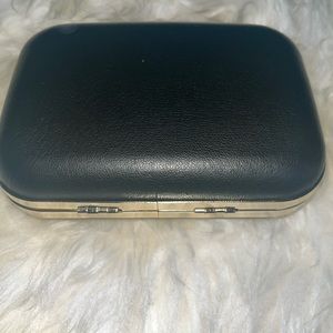Daniel black clutch